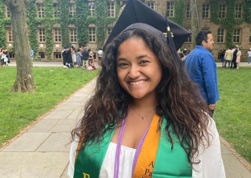 Me at my graduation last year proudly wearing my FLI (First Gen Low Income) Stole