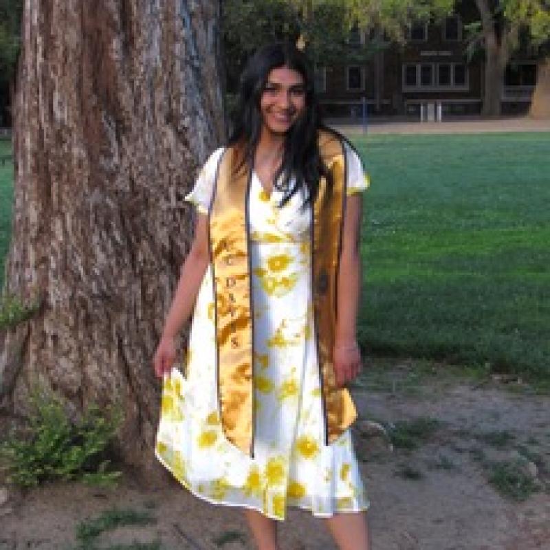 Image of Ravina in her UC Davis Graduation Dress and Sash