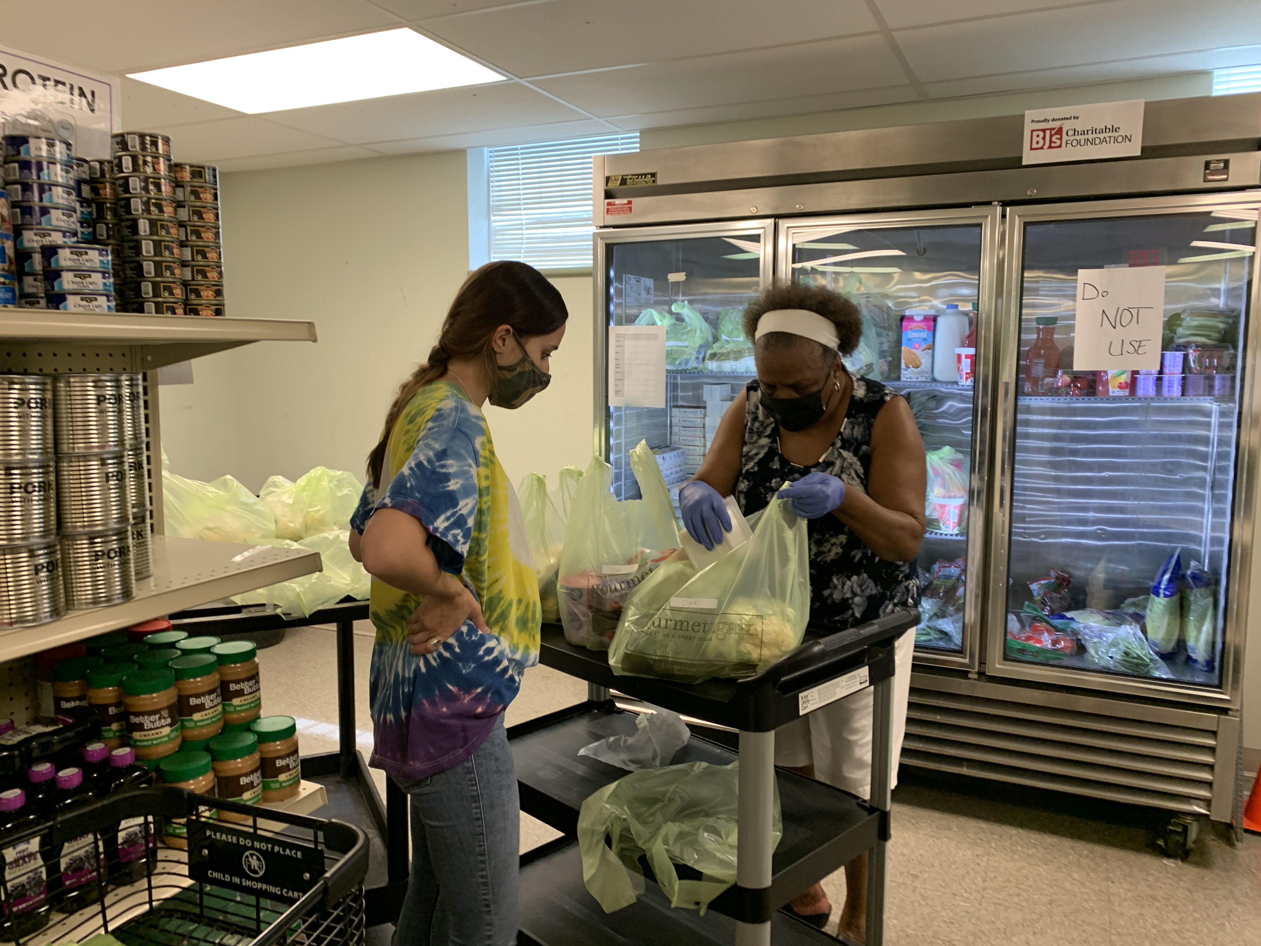"Volunteers packaging Delaware Food Farmacy orders of fresh produce for Lutheran Community Services."