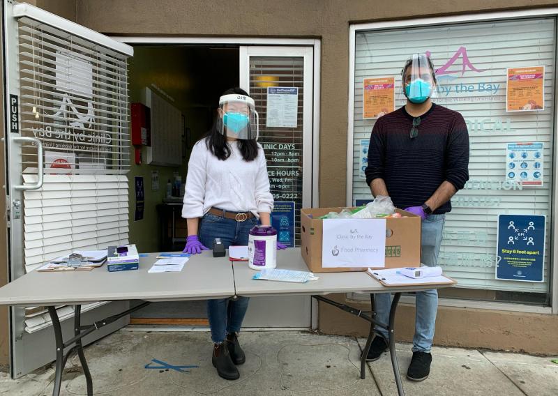 Cindy Won (left) serving at Clinic by the Bay's Food Pharmacy. 