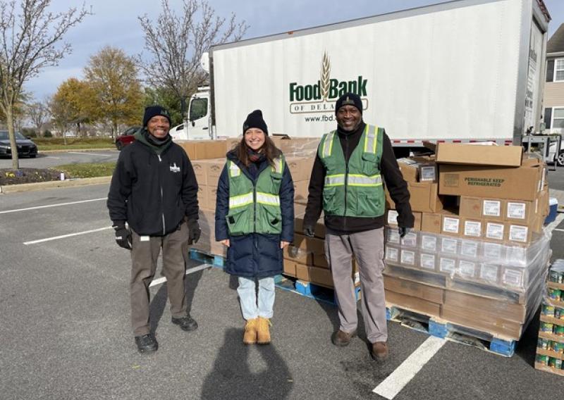 (From left to right: Lanier Williams [Food Bank of Delaware Driver] Penelope Velasco [NHC Member], and Alfred Mapp, [longtime loyal Food Bank of Delaware volunteer]